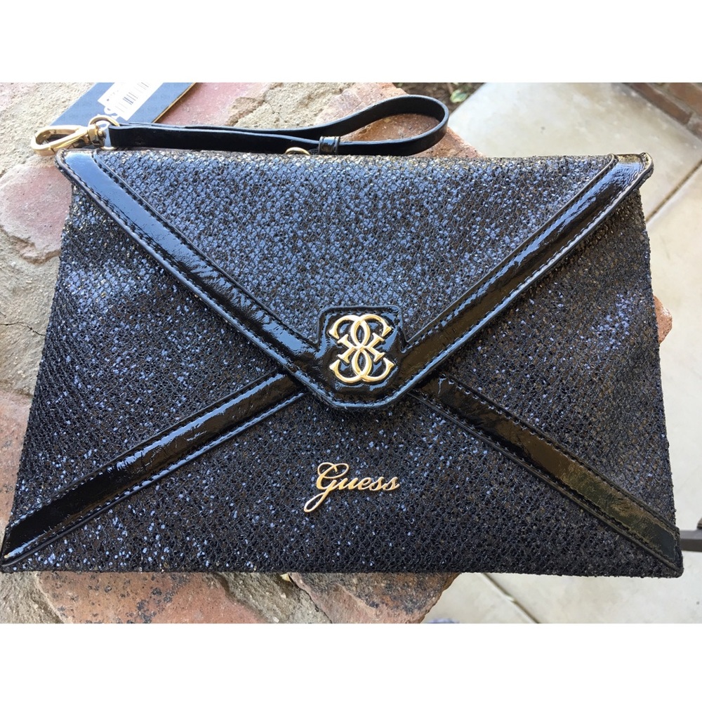 New with tags! Black Guess Clutch Wristlet